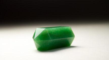 jade pencil on light background