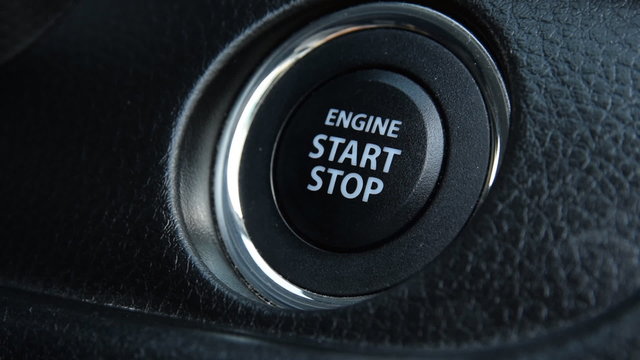 Engine start stop button from a modern car interior