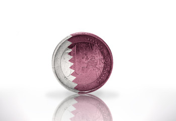euro coin with qatar flag on the white background