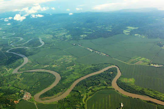 Meandering river viewed from the airplane in Costa Rica