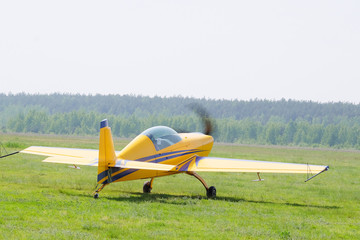 Fototapeta na wymiar The image of a sport propeller airplane