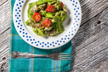 Asparagus tagliatelle with green pesto.