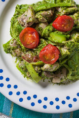 Asparagus tagliatelle with green pesto.
