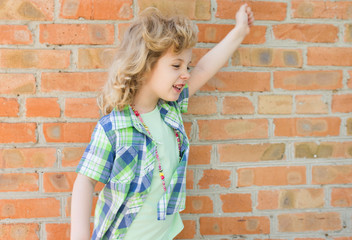 Child girl screaming with happy expression hand up
