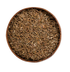 dried cumin in a wooden bowl