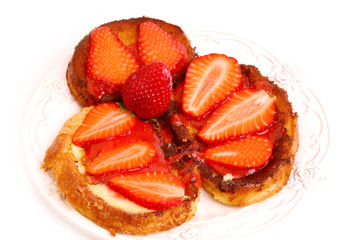 Breakfast French toast with strawberries isolated on white background