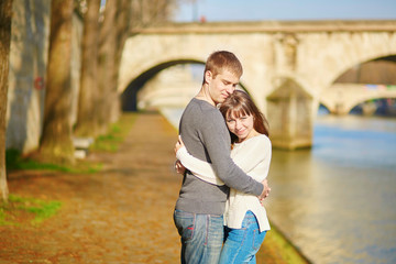 Fototapeta premium Young loving couple in Paris