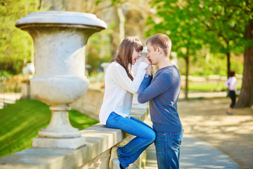 Fototapeta premium Young loving couple in Paris