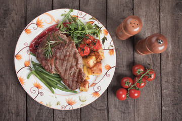Beef steak with potato and vegetables