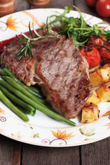 Beef steak with potato and vegetables