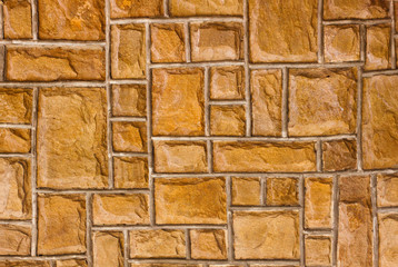 External brown stone wall background