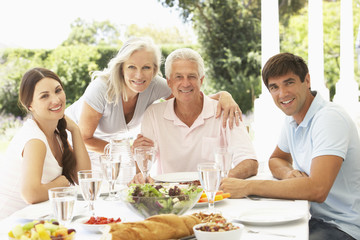 Parents and Adult Children enjoying Al Fresco Meal