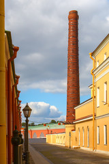 Old factory chimney in the city © horheo