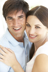 Young couple Hugging and smiling