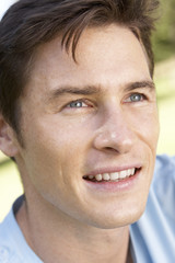 Fototapeta premium Portrait Of Young Man Relaxing In Park