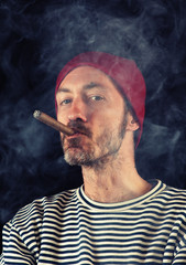 Sailor smoking a cigar