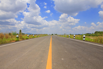 Stock Photo - Road and cloud on blue sky.