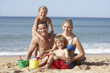 Portrait Of Family Enjoying Beach Holiday