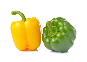 sweet green and yellow pepper isolated on white background