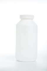 .Pills and drug container isolated