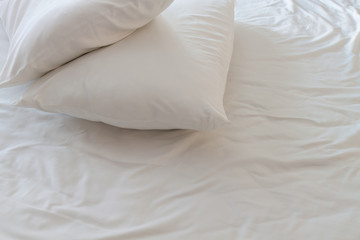 White pillows on a bed