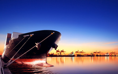 container ship in import,export port against beautiful morning l