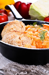Meatballs with braised cabbage