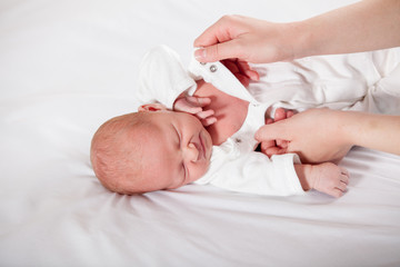 Newborn baby disguised , ready to replace diapers