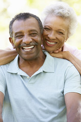 Portrait Of Romantic Senior African American Couple In Park