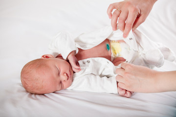 Newborn baby disguised , ready to replace diapers