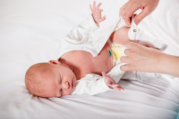 Fototapeta na wymiar Newborn baby disguised , ready to replace diapers