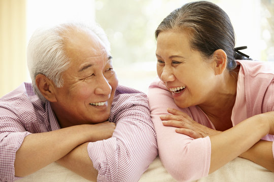 Senior Asian couple at home