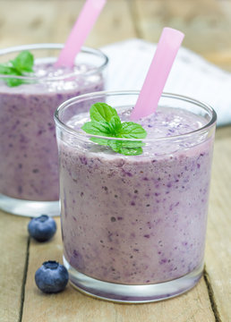 Fresh smoothie with blueberry, banana and yogurt