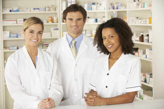 Nurse and pharmacists working in pharmacy