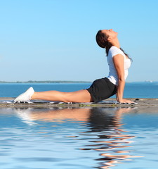 Beautiful Yoga woman Practicing Yoga