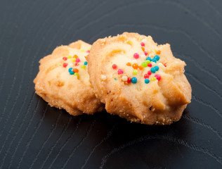 cookie on black wooden table