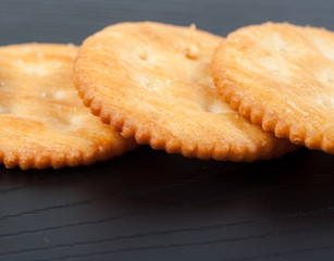cracker on black  wooden
