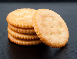 cracker on black  wooden