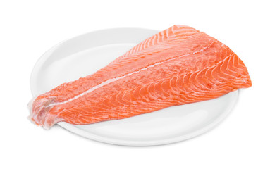 Raw salmon fillet on plate.