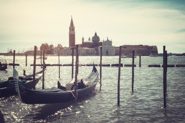 Gondolas docked on Piazza San Marco Venice aged