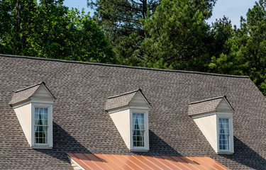 Three Dormers over Asphalt and Copper