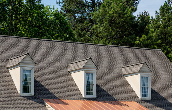 Three Dormers over Asphalt and Copper