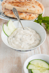 Raita a cooling dip made with yoghurt cucumber and mint