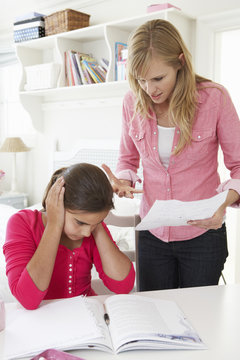 Mother Telling Daughter Off For Bad School Report