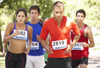 Obraz premium Group Of Marathon Runners At Start Of Race