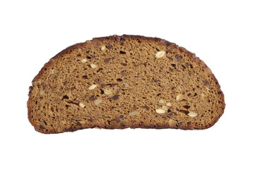 Slice of black bread with sunflower seeds, nuts, raisins and dri