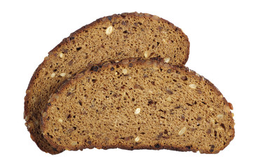 Two slices of bread with sunflower seeds, nuts, raisins and drie