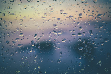 Drops of rain on glass with filter effect retro vintage style
