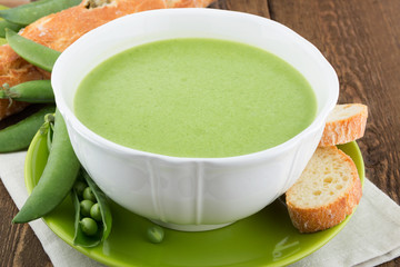 A bowl of soup on a rustic background