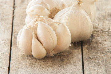 garlic close up on wooden background